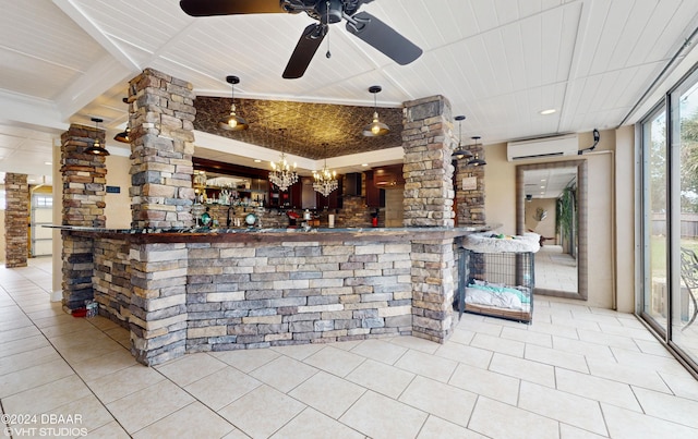 bar with hanging light fixtures, ceiling fan with notable chandelier, light tile patterned floors, and a wall unit AC