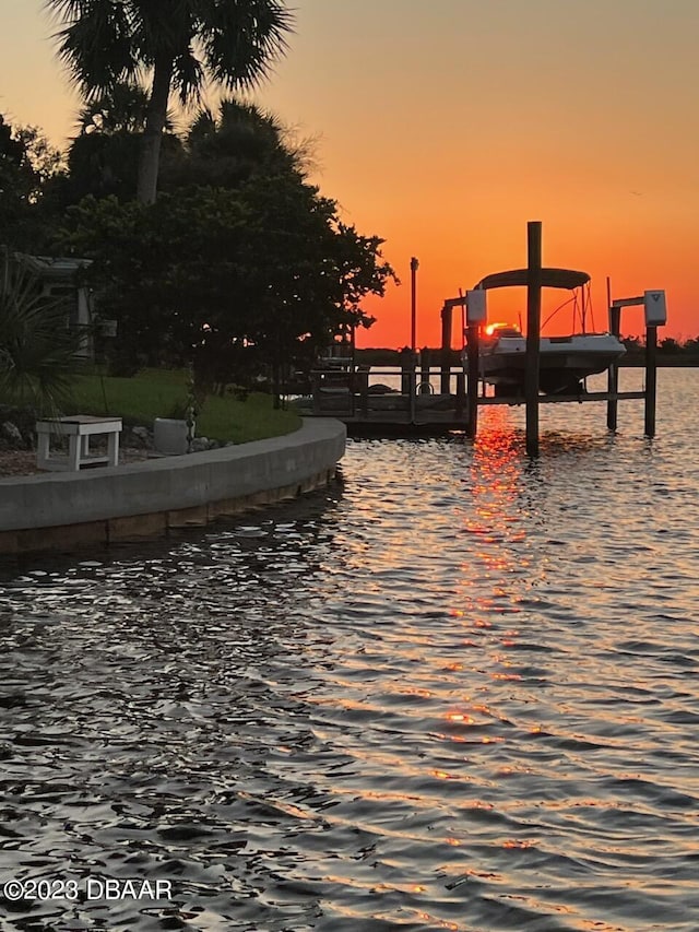 view of dock with a water view