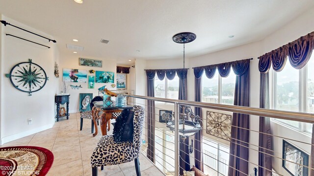 hall with tile patterned flooring