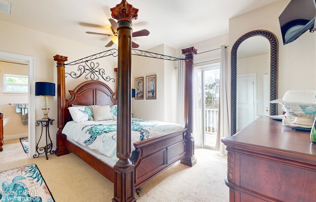 bedroom with ceiling fan, light colored carpet, and access to outside