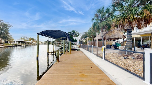 dock area featuring a water view