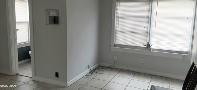 312 Frances Ter, Daytona Beach, FL 32118 - spare room with light tile patterned floors and plenty of natural light
