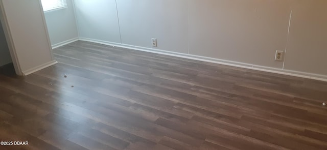 312 Frances Ter, Daytona Beach, FL 32118 - empty room featuring dark wood finished floors and baseboards