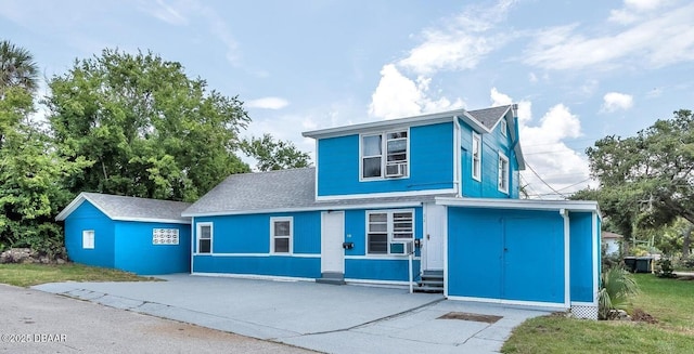 312 Frances Ter, Daytona Beach, FL 32118 - traditional-style home with entry steps and a shingled roof