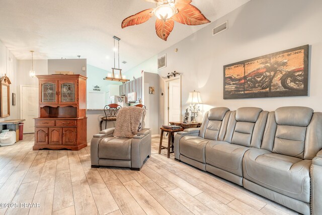 198 Heather Lane Dr, Deltona, FL 32738 - living room with lofted ceiling, light wood-style flooring, and ceiling fan