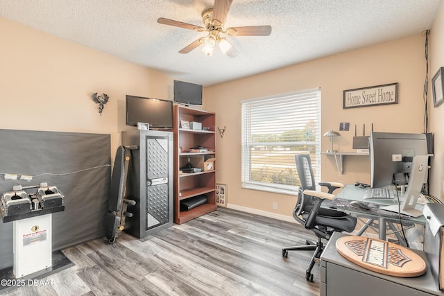 198 Heather Lane Dr, Deltona, FL 32738 - office area with ceiling fan, wood finished floors, and a textured ceiling