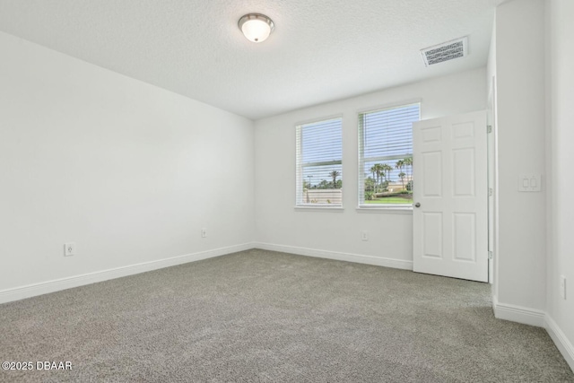288 Links Terrace Blvd, Daytona Beach, FL 32124 - spare room featuring carpet and a textured ceiling