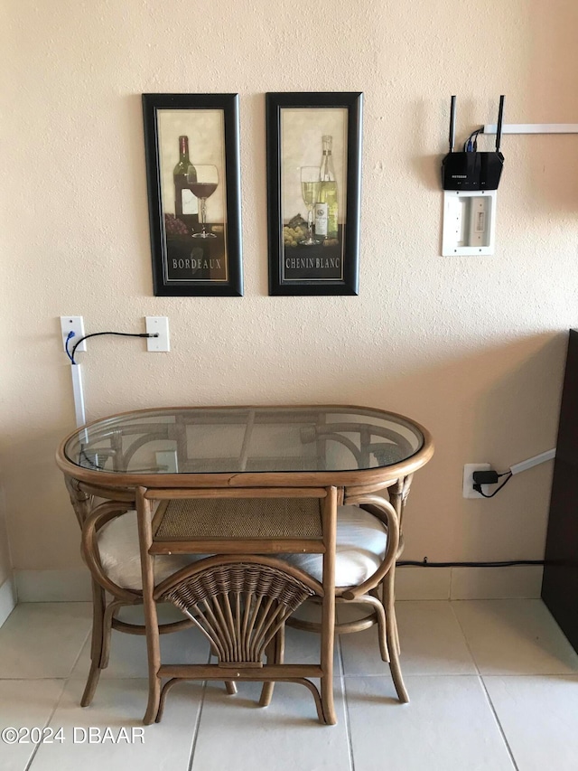 dining room featuring light tile patterned floors