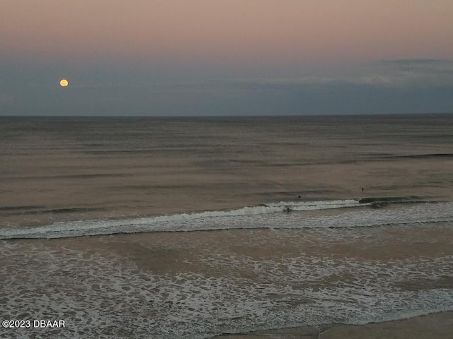 property view of water featuring a beach view