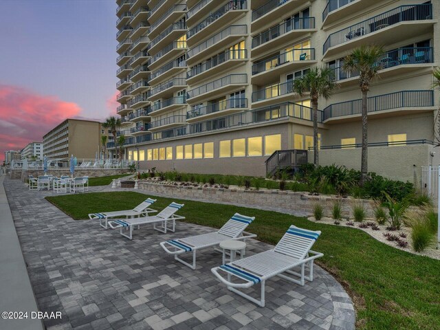 3425 S Atlantic Ave Unit 1105, Daytona Beach Shores, FL 32118 - surrounding community featuring a lawn