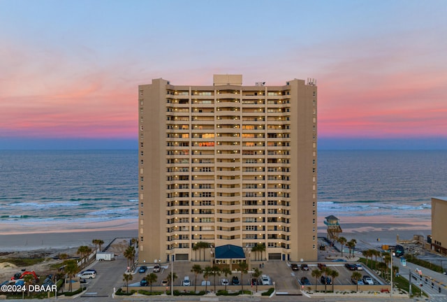 outdoor building at dusk with a water view