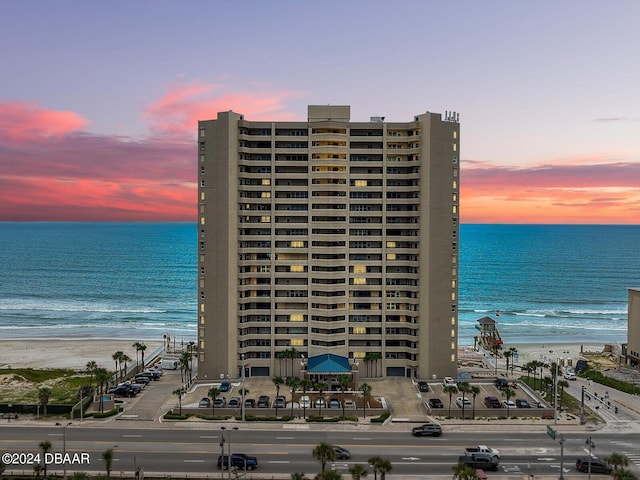 outdoor building at dusk with a water view