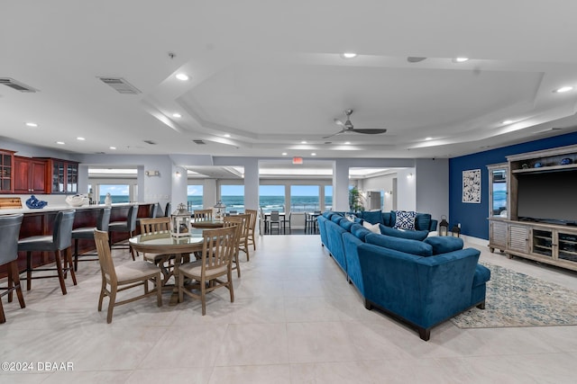 3425 S Atlantic Ave Unit 1105, Daytona Beach Shores, FL 32118 - dining area with a tray ceiling, a ceiling fan, recessed lighting, and light tile patterned floors