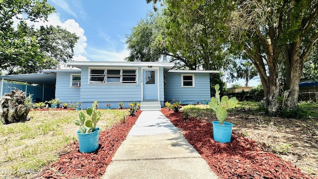 1228 Leon Ln, Daytona Beach, FL 32117 - bungalow featuring a carport