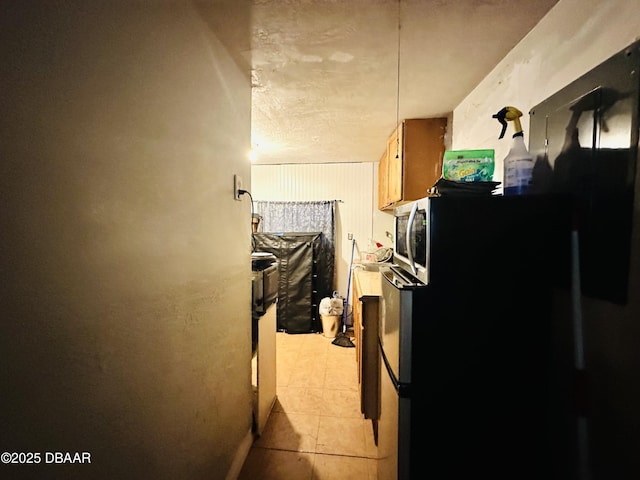 1228 Leon Ln, Daytona Beach, FL 32117 - corridor with light tile patterned flooring
