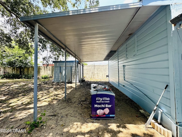 1228 Leon Ln, Daytona Beach, FL 32117 - view of vehicle parking with a shed