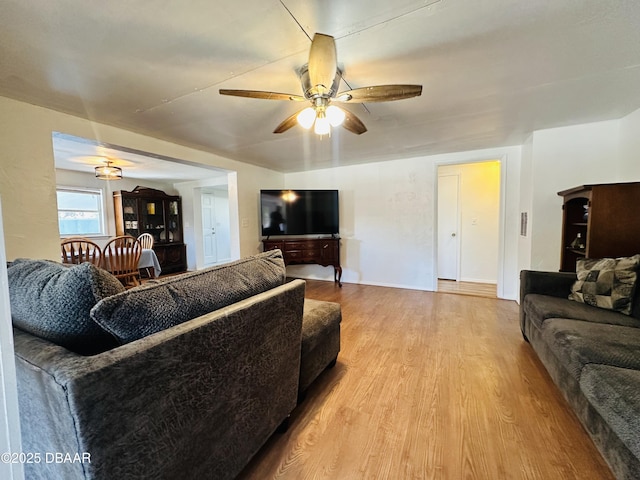 1228 Leon Ln, Daytona Beach, FL 32117 - living area with a ceiling fan, wood finished floors, and baseboards