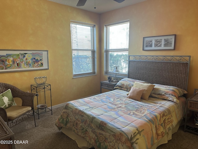 3651 S Central Ave Unit 101, Flagler Beach, FL 32136 - bedroom with carpet, baseboards, and ceiling fan