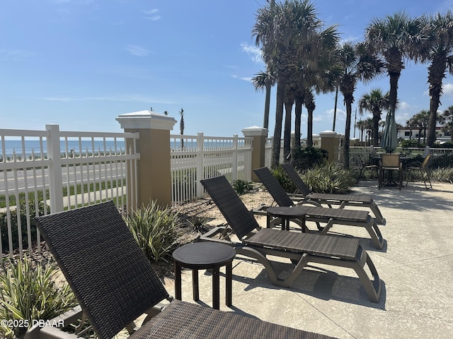 3651 S Central Ave Unit 101, Flagler Beach, FL 32136 - view of patio / terrace featuring outdoor dining space and a water view