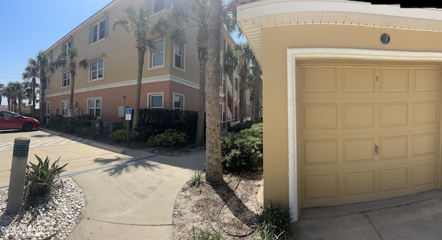3651 S Central Ave Unit 101, Flagler Beach, FL 32136 - garage with driveway
