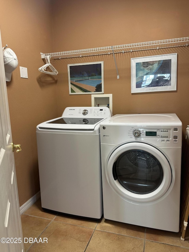 3651 S Central Ave Unit 101, Flagler Beach, FL 32136 - washroom with independent washer and dryer and light tile patterned floors