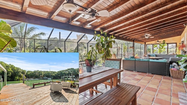 exterior space with ceiling fan, wood ceiling, and vaulted ceiling with beams