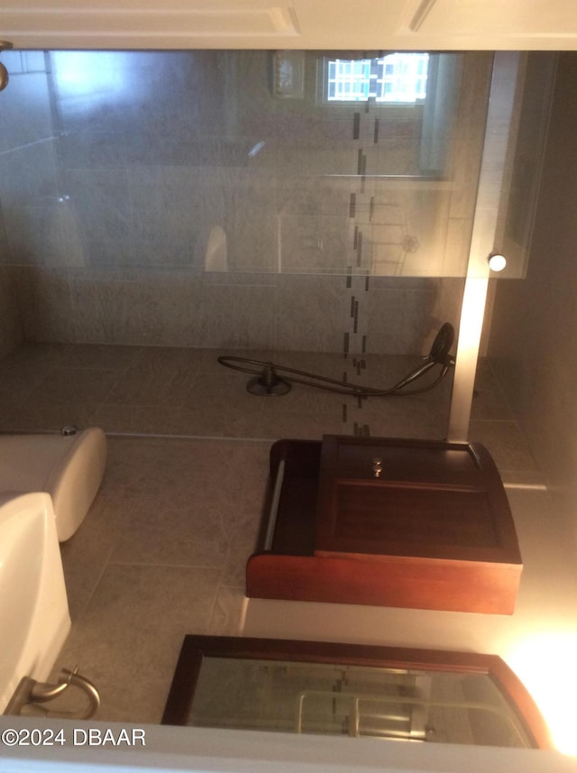 bathroom with tile patterned flooring