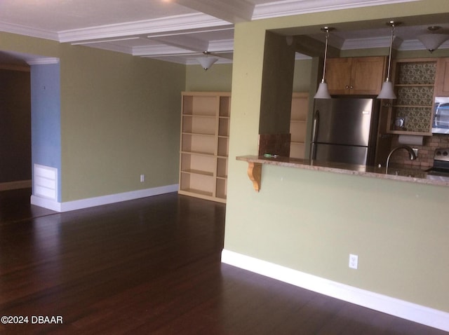 kitchen with stainless steel appliances, dark hardwood / wood-style floors, crown molding, beam ceiling, and pendant lighting