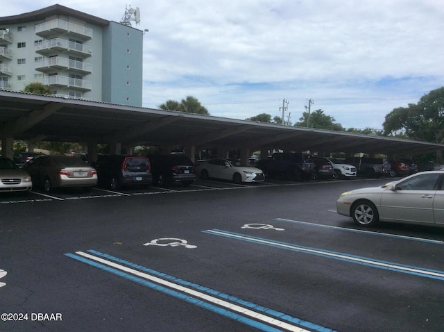 view of parking with a carport