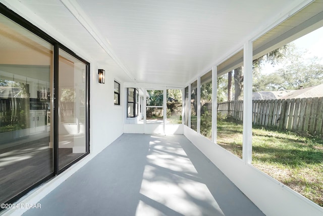 sunroom / solarium featuring plenty of natural light