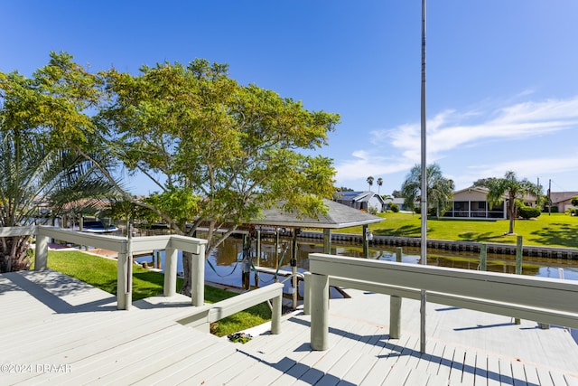 dock area with a water view