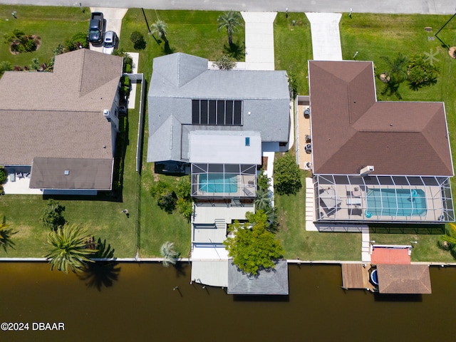 bird's eye view with a water view