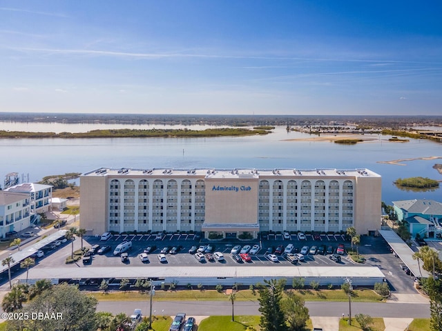 drone / aerial view with a water view