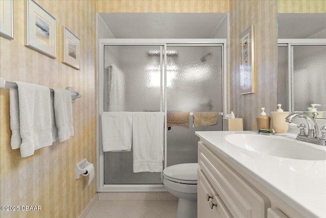5 Southern Pine Trl, Ormond Beach, FL 32174 - bathroom with wallpapered walls, tile patterned flooring, vanity, and a stall shower