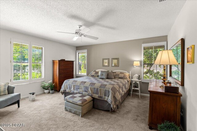 5 Southern Pine Trl, Ormond Beach, FL 32174 - bedroom with carpet, a textured ceiling, and a ceiling fan