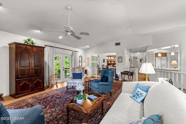 5 Southern Pine Trl, Ormond Beach, FL 32174 - living room featuring vaulted ceiling, french doors, ceiling fan, and light wood-type flooring