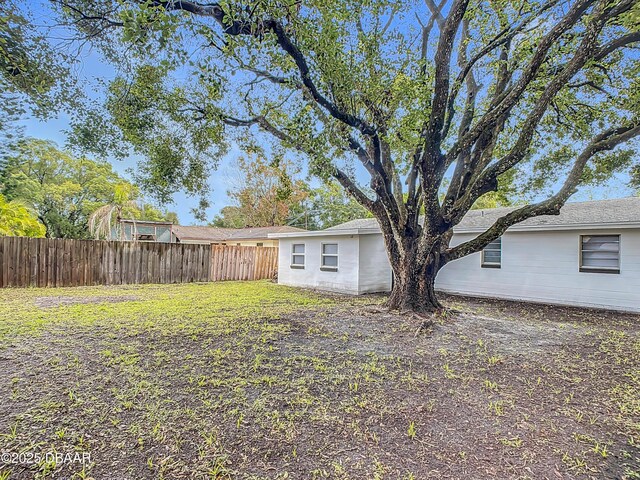 view of yard featuring fence