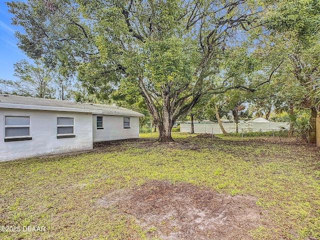 view of yard with fence