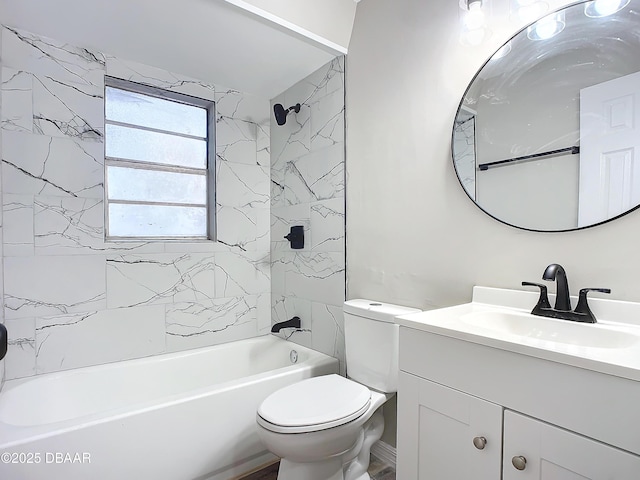 bathroom featuring vanity, bathtub / shower combination, and toilet