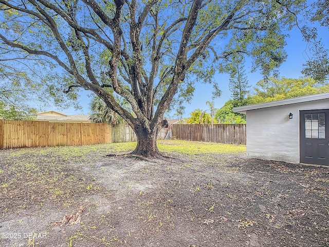 view of yard featuring a fenced backyard
