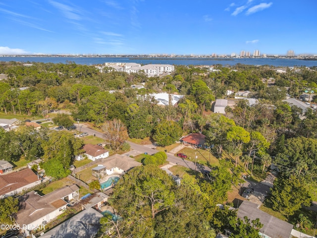 drone / aerial view with a residential view and a water view