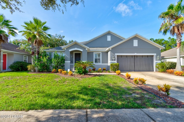 ranch-style home with a garage and a front lawn