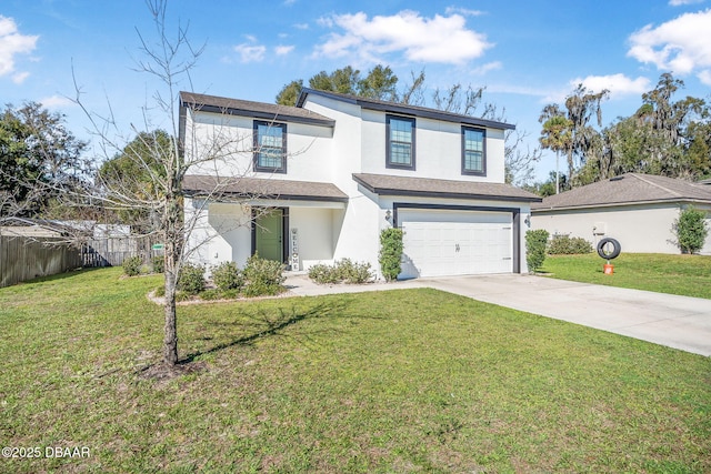 view of property featuring a front lawn and a garage