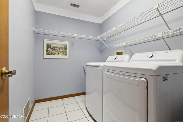 bathroom featuring a skylight, tile patterned flooring, and vanity