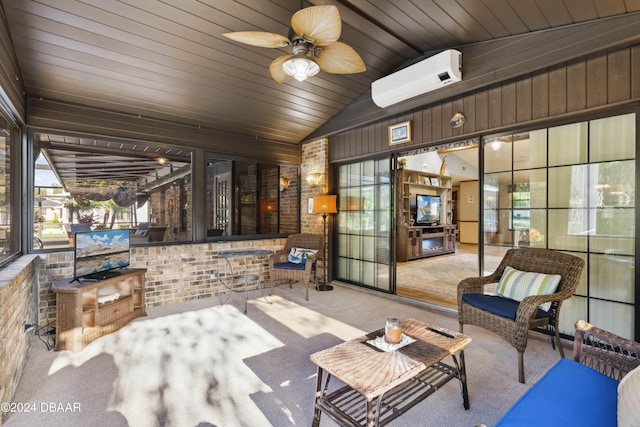 view of patio featuring ceiling fan and a wall unit AC