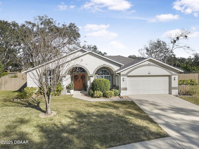 ranch-style house featuring a garage and a front yard