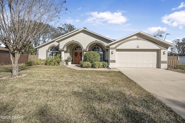 ranch-style house with a garage and a front lawn