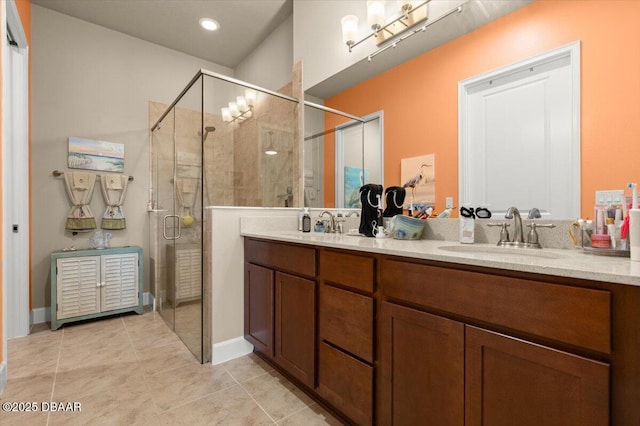 6341 Hanfield Dr, Port Orange, FL 32128 - full bathroom with a sink, tile patterned floors, a shower stall, and double vanity