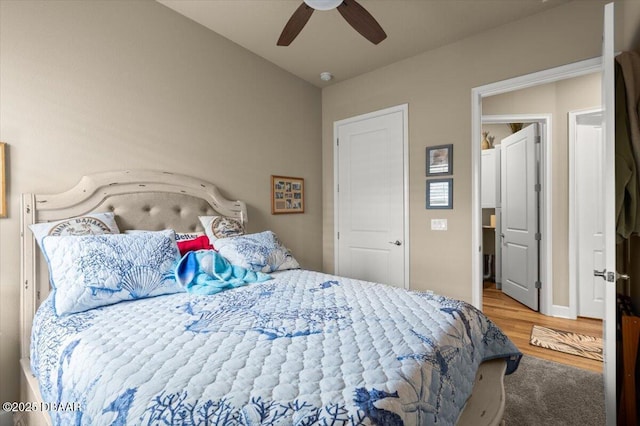 6341 Hanfield Dr, Port Orange, FL 32128 - bedroom with lofted ceiling, wood finished floors, and ceiling fan