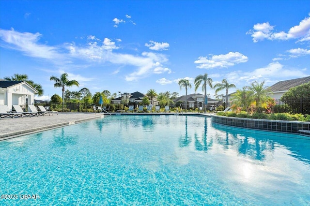 6341 Hanfield Dr, Port Orange, FL 32128 - community pool with a patio area and fence